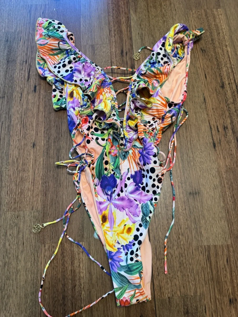 Luli Fama open sides one piece body suit